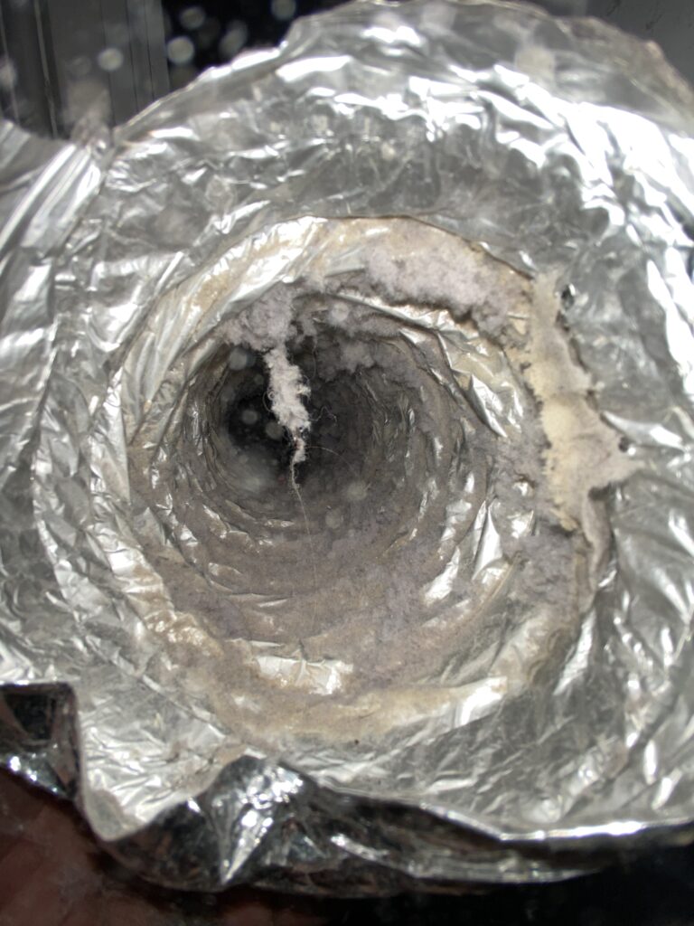 Lint accumulation in dryer vents.