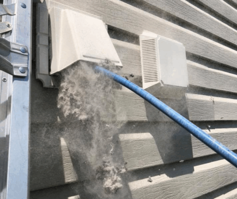 A technician employs professional tools to thoroughly clean a dryer vent, promoting efficient operation and safety.